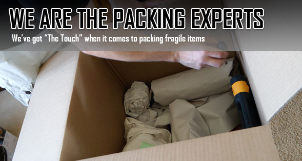 Person packing a box with the text, "We are the packing experts. We've got "the touch" when it comes to packing fragile items."